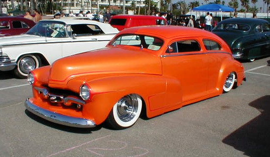 This 54 Chevy is dropped chopped nosed decked shaved frenched and has 