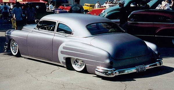 Here's another 54 Chevy This sedan has a very nice chop along with some 